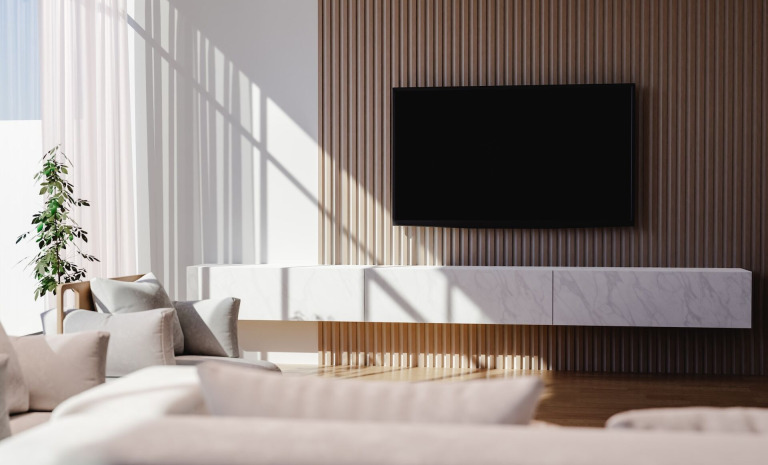 Aranżacje ściany z telewizorem. Czym ją wykończyć? Poradnik