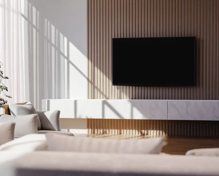 Aranżacje ściany z telewizorem. Czym ją wykończyć? Poradnik